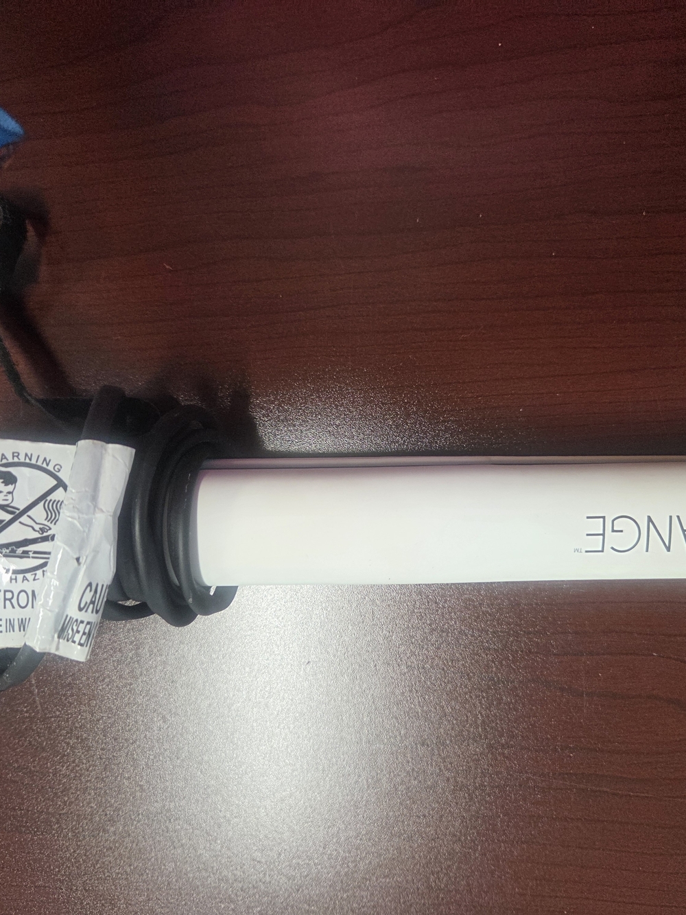 White Styling Wand (Visible "NANCE")